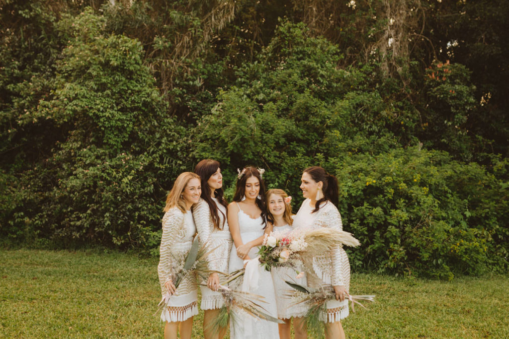 bridesmaids in gold dresses with fringe