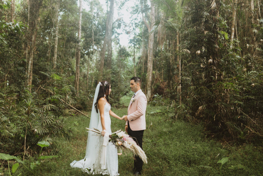 bride and groom portraits in the rain forest of Australia
