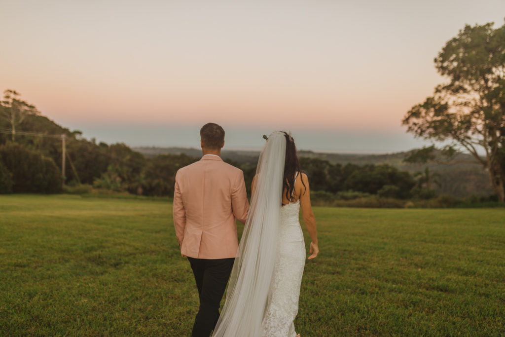 bride and groom take sunset portraits