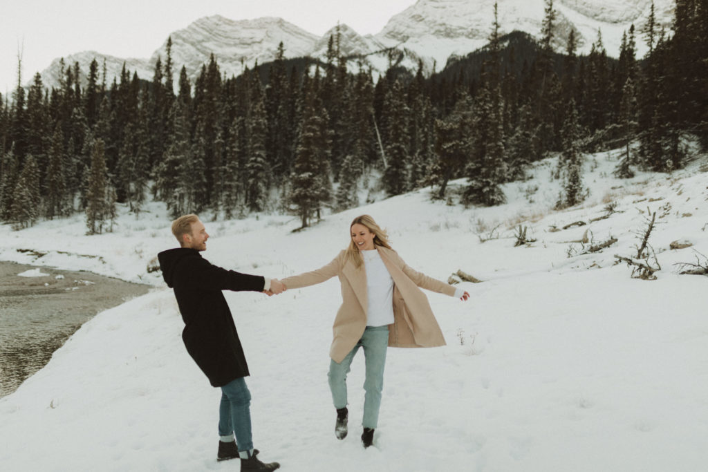 winter engagement photos in the mountains of Canmore