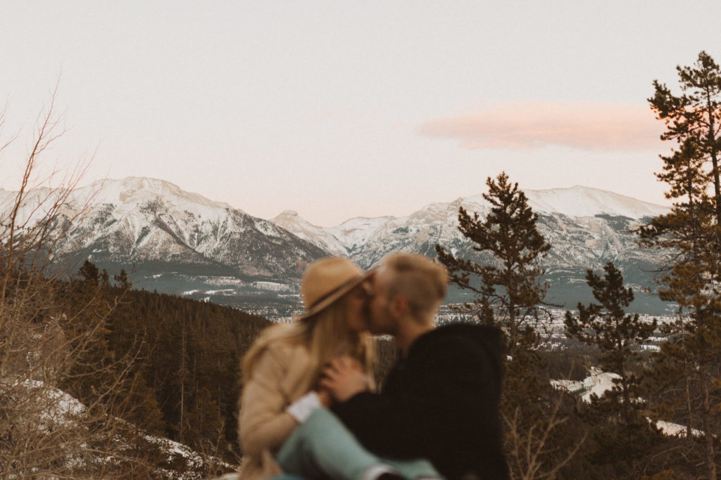 winter mountain sunset engagement photos in Canmore