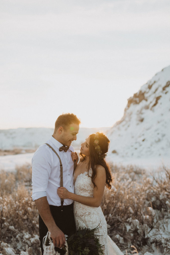 bride and groom at golden hour in winter