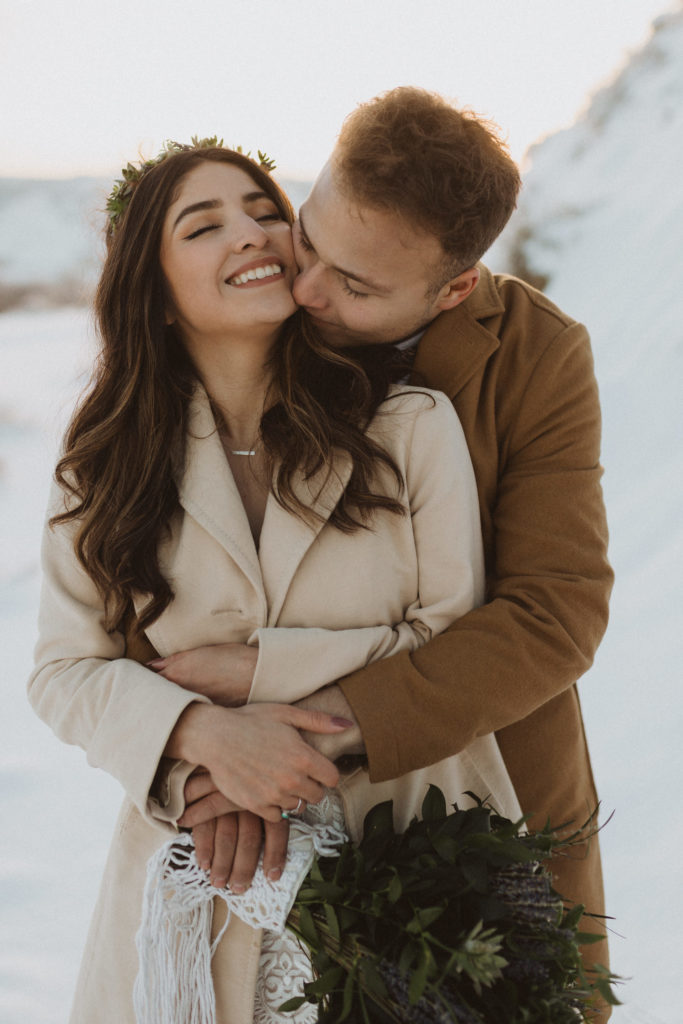 Cold elopement day in the snowy hills