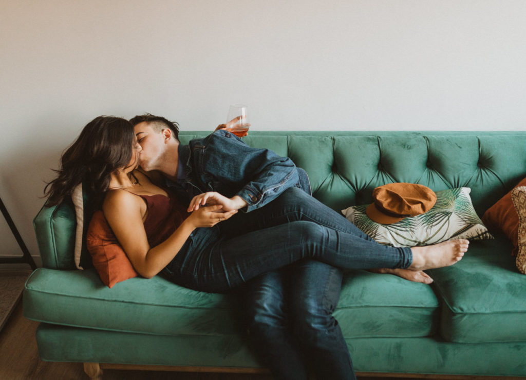 couple laying on couch