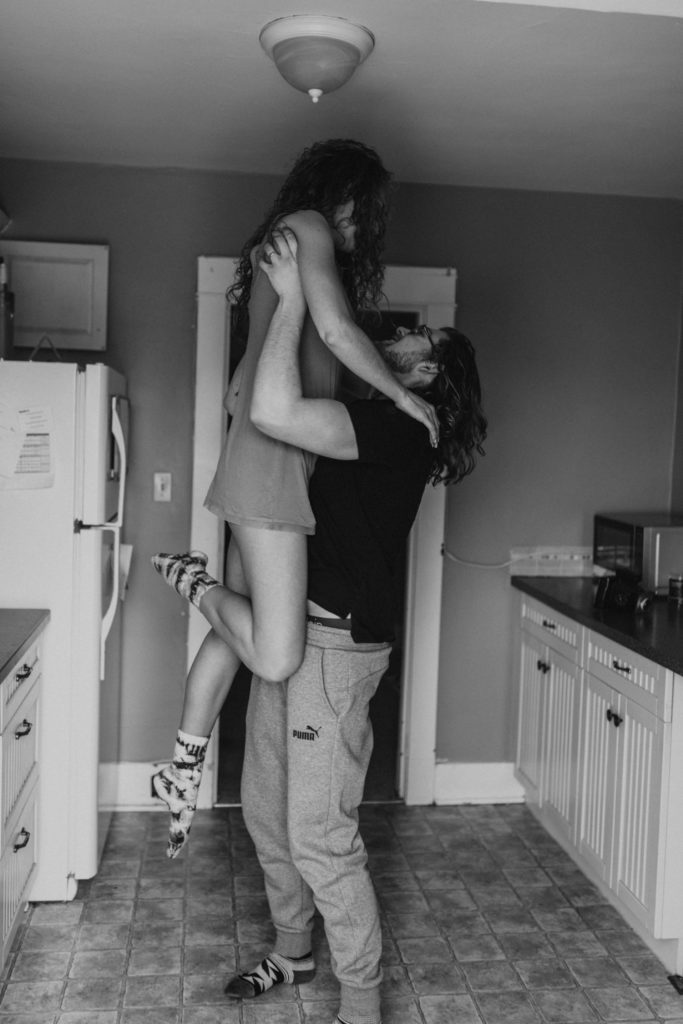 black and white couples photo in home