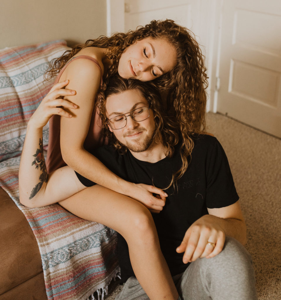 cozy in home couple's session on couch