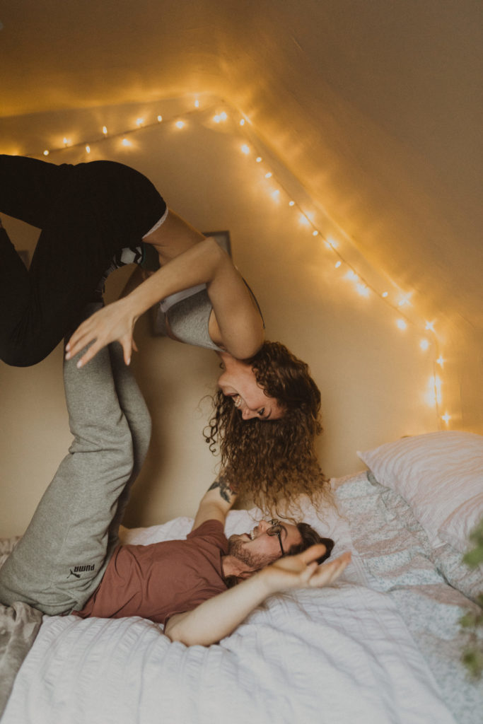 couple's in-home session airplane in bed