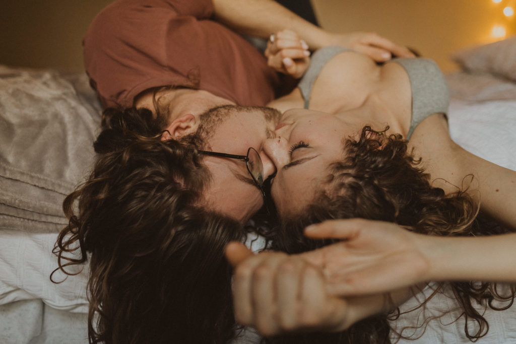 cozy in-home couple's session with lots of kissing and snuggling 