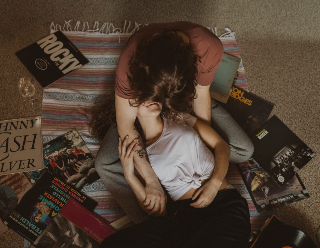 couple's in-home session listening to records