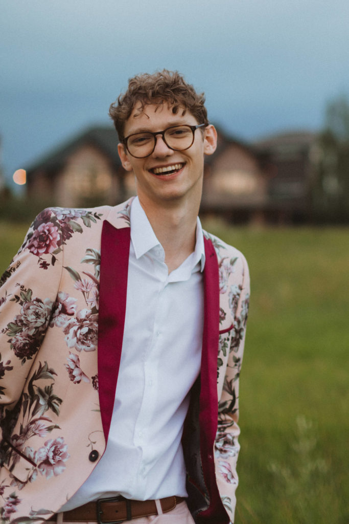 hipster groom in floral suit