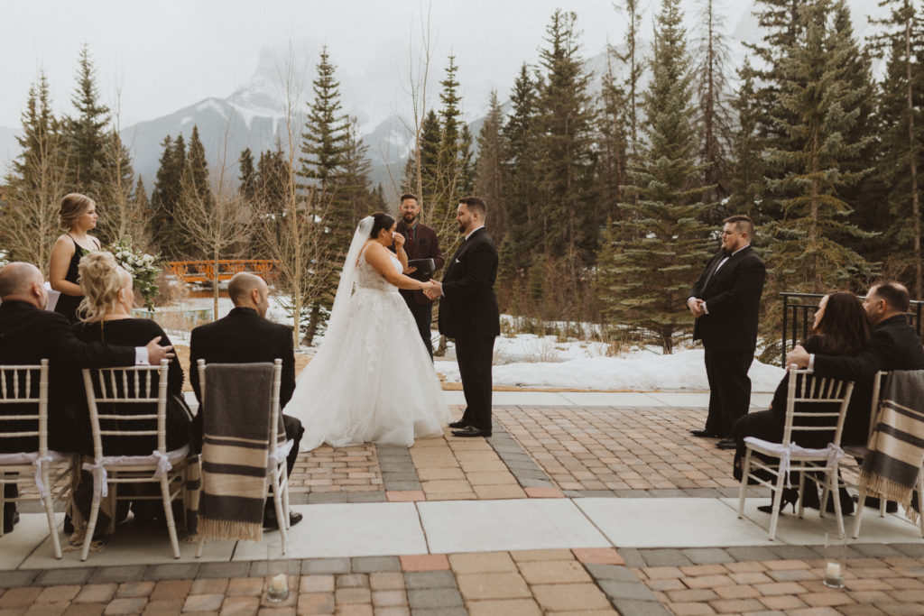 Elopement ceremony with immediate family at the Malcolm hotel in Canmore, Alberta.