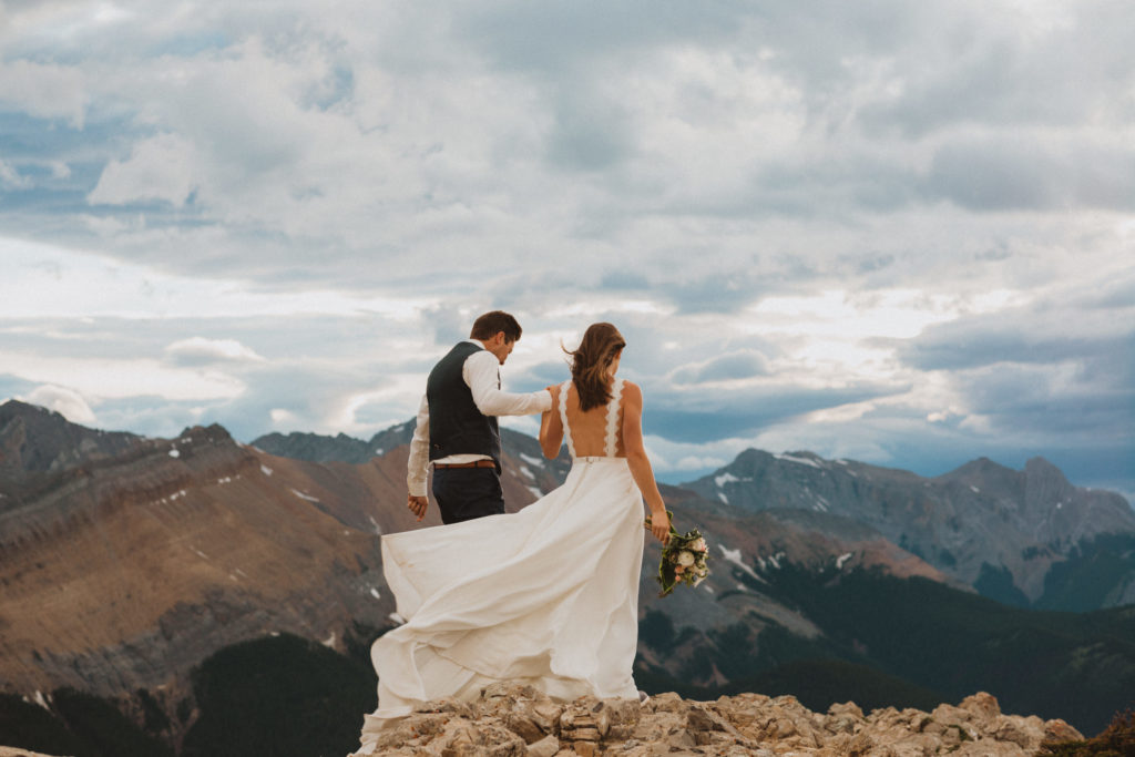 remember to leave no trace when eloping in the mountains. This couple hiked up in Jasper National Park for their mountaintop elopement and made sure to stay on the trails, watch out for wildlife, and pack out what they packed in