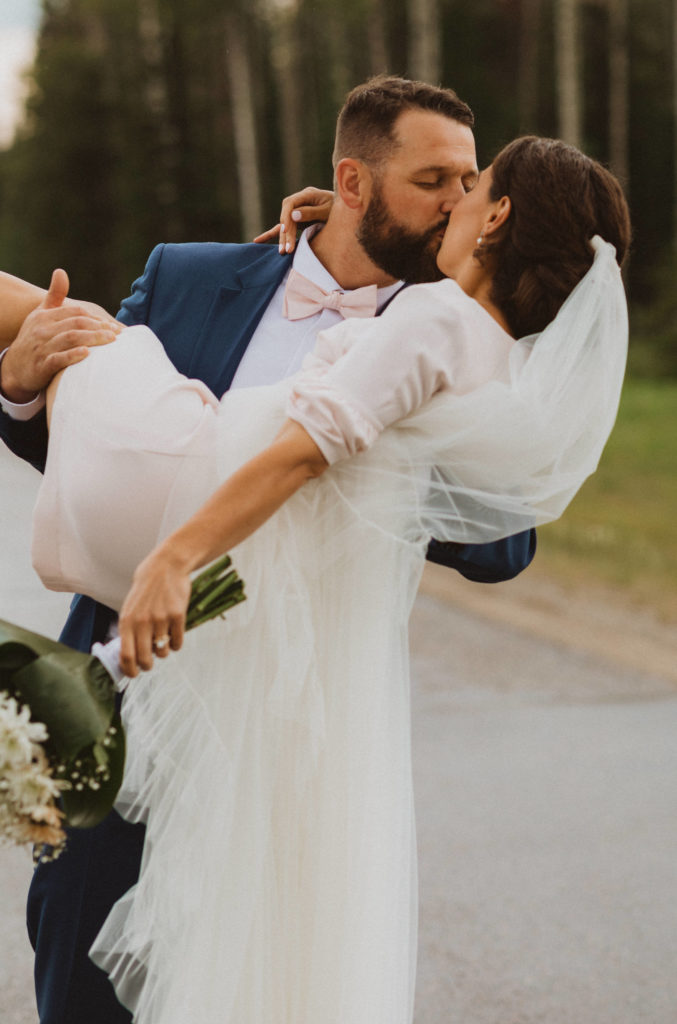 Post ceremony portraits by Liv Hettinga Photography at a sweet Alberta cabin elopement