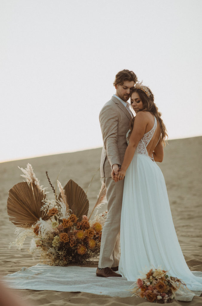 Deserty Sand Dunes Elopement on 2021-06-05 in The Great Sandhills, Leader, captured by Liv Hettinga Photography.