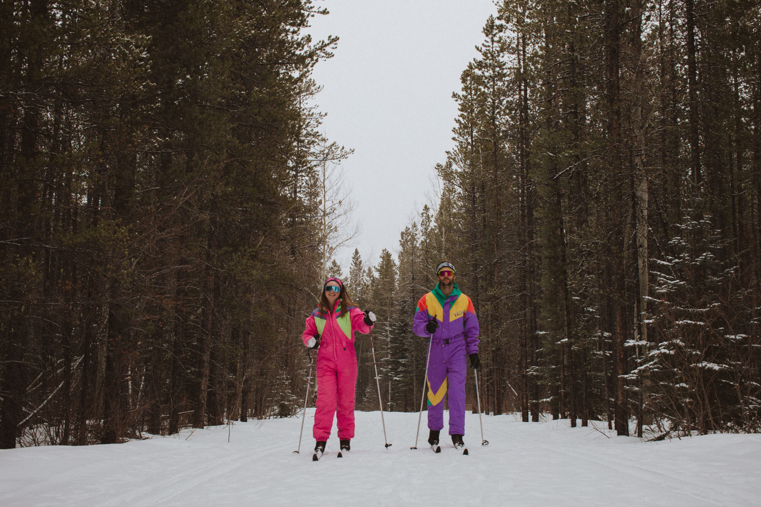 couple cross-country skiing in Banff National Park, winter travel guide