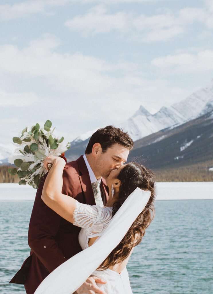 couple elopes in Kananaskis, Alberta with their immediate family and then has a party to celebrate with their friends after
