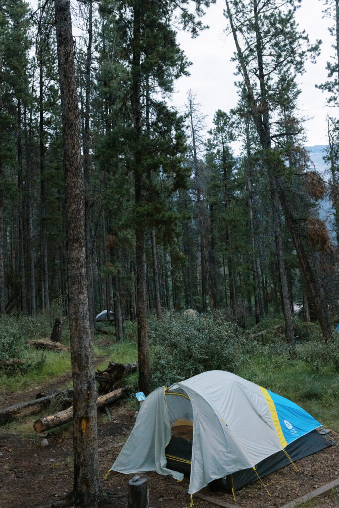 tent at campsite during backcountry elopement in Banff, what to pack